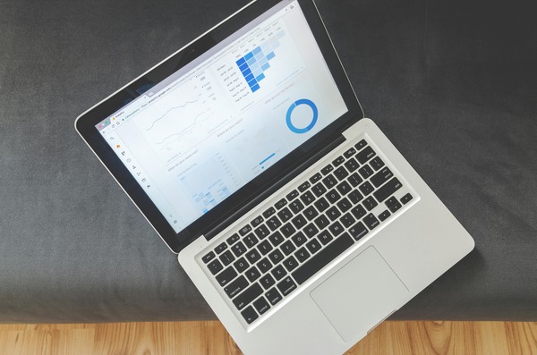 Laptop screen displaying a crypto analytics dashboard
