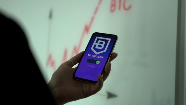Smartphone showing a blockchain wallet app connecting screen