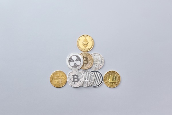 Bitcoin, Ethereum, Ripple and Litecoin cryptocurrency coins arranged together